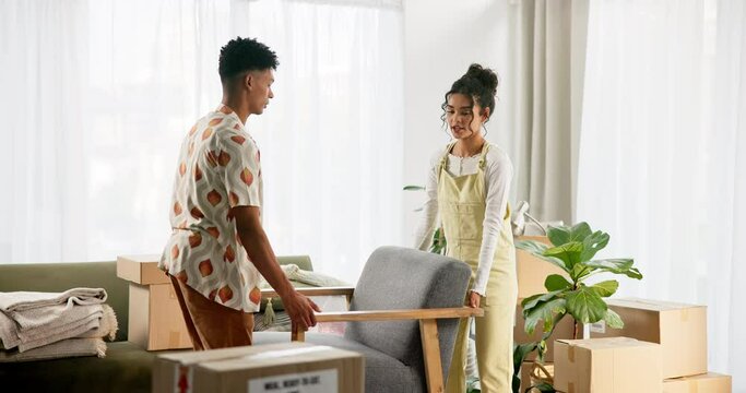 Couple, people and chair with boxes in home or new house for moving in with furniture. Relationship, ownership and love with support, help and care for organizing with unpacking and future together