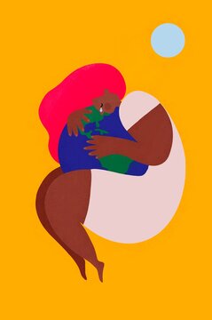 A woman hugging the Earth
