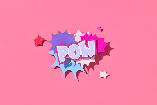POW. Handmade paper cutout pop art comic background with speech bubble