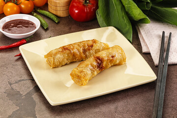 Vietnamese stuffed spring roll served sauce