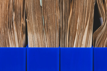 Close up of stacked old newspapers