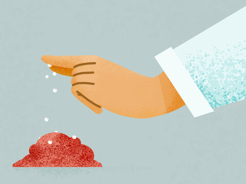 Hand of person adding pinch of salt on food