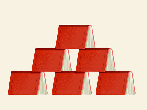 Stack of red books forming pyramid