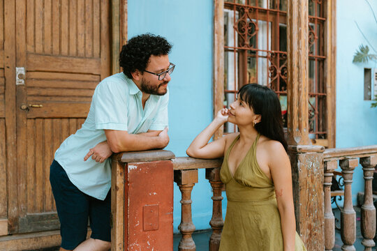 Couple Gazing at Each Oher in Picturesque Street