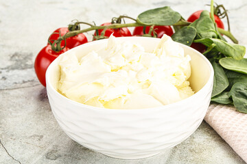 Soft cream cheese in the bowl