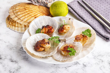 Grilled scallops shell with butter