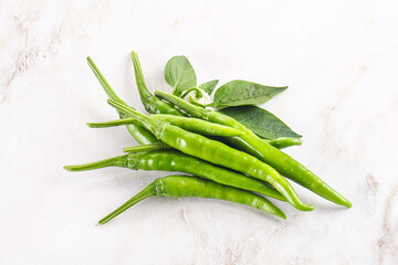 Spicy green chili pepper heap