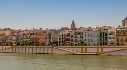 The view across the Canal de Alfonso XIII (translated to Alfonso XIII Canal), towards the district...