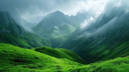 Obraz premium Misty Mountain Ranges with Lush Green Valleys