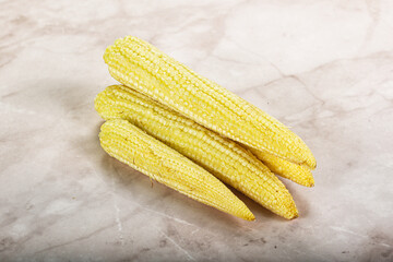 Raw sweet baby corn heap