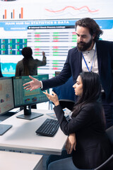 Diverse business analysts working together to evaluate costs and create a projection to deduct the future enterprise situation. Financial advisers specialists studying budget numbers.