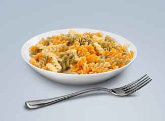 Spicy tasty pasta noodles in a plate