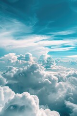 Naklejka premium Airborne perspective on fluffy white clouds against a clear blue sky