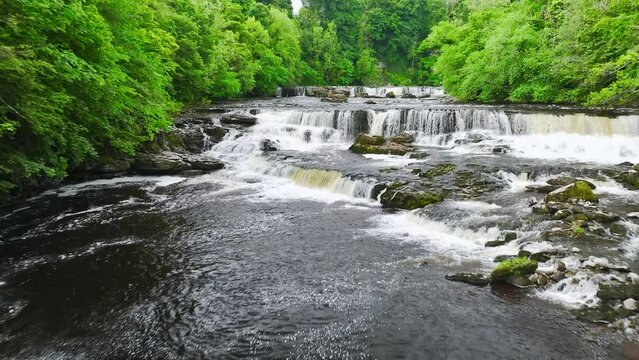 Aysgarth Falls on River Ure from a drone, Yorkshire Dales National Park, North Yorkshire, England