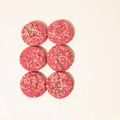 Sweet pink cookies pattern. Concept of diet light food. Sugar free