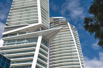 Modern skyscrapers reaching for the sky on a bright day. Limassol, Cyprus