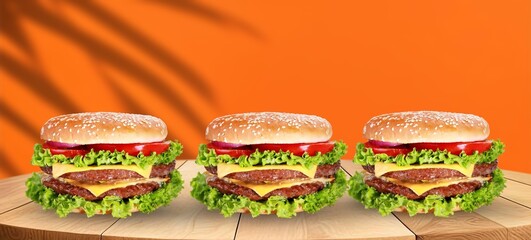 Tasty fresh hot burger on a wooden board