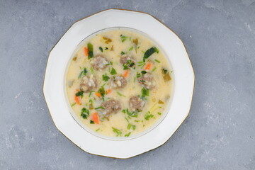 Meatball soup with carrot and potatoes named eksili terbiyeli sulu kofte or eksili kofte