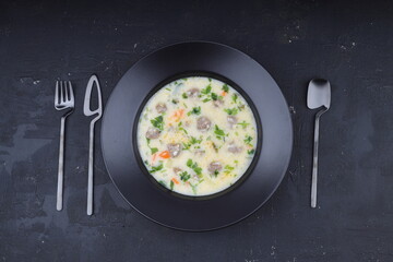 Meatball soup with carrot and potatoes named ekşili terbiyeli sulu köfte or eksili kofte