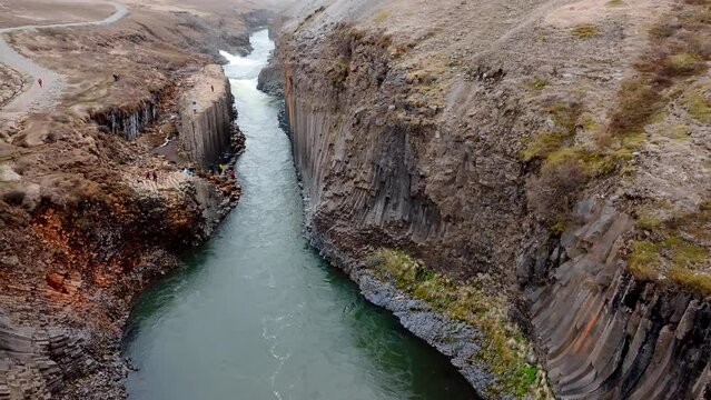 Aerial view of the Studlagil Canyon in Iceland with a beautiful view of Jokulsa A Bru river.