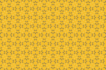 A yellow and black patterned background with a white and black design