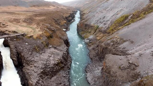 Aerial view of the Studlagil Canyon in Iceland with a beautiful view of Jokulsa A Bru river.