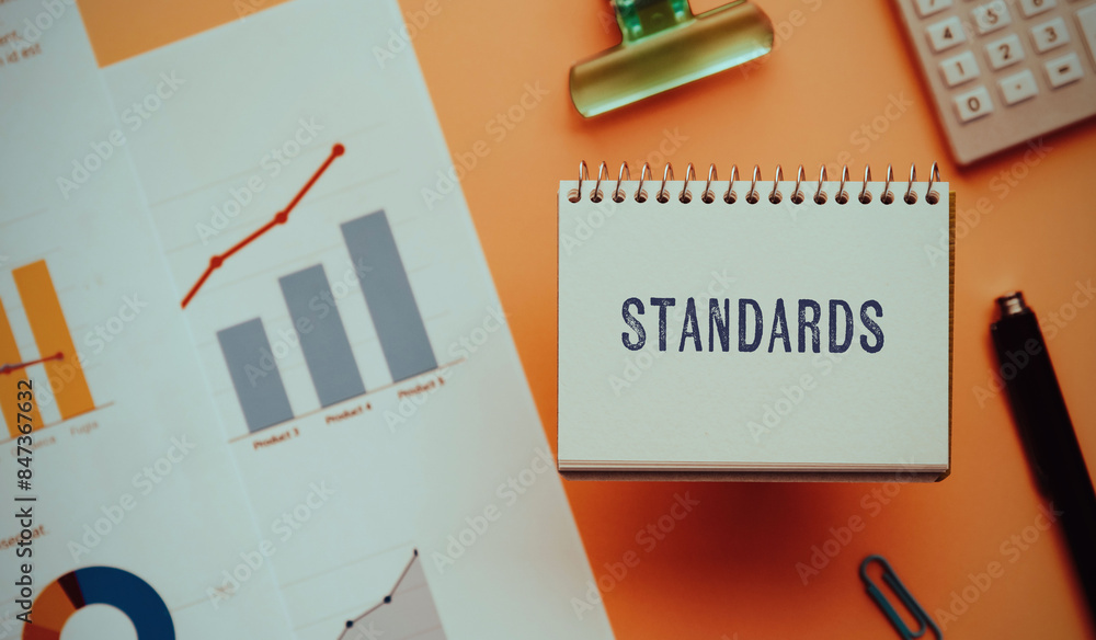 Poster there is notebook with the word standards. it is as an eye-catching image.