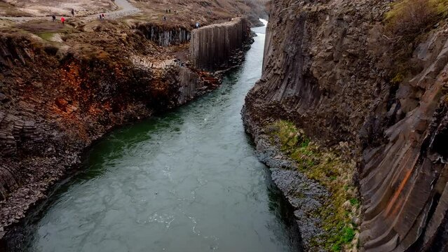 Aerial view of the Studlagil Canyon in Iceland with a beautiful view of Jokulsa A Bru river.