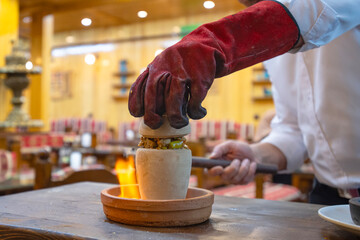 Testi Kebab traditional Turkish meal cooked in the clap pot.