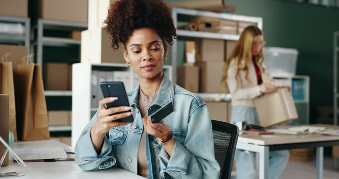 Business woman, credit card and online shopping with phone in logistics for payment, shipping or order at store. Young female person with debit for ecommerce, purchase or mobile banking on smartphone
