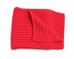 One red knitted scarf on white background, top view