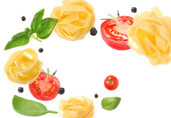 Raw pasta, tomatoes and basil in air on white background