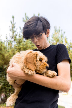 Teenager with New Puppy