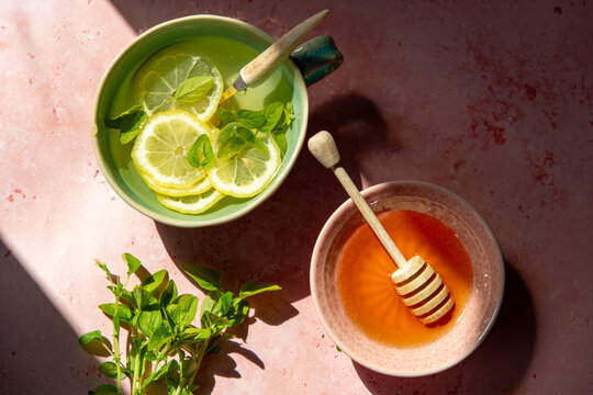 A cup of lemon, honey and oregano tea. 