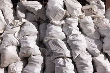 construction material and garbage  placed in bags