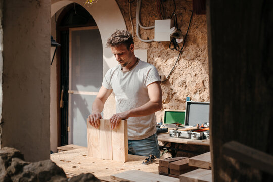 Carpenter working at his workshop