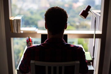 silhouette of men working from home