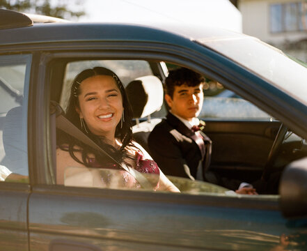 Teenage Couple Driving to Prom