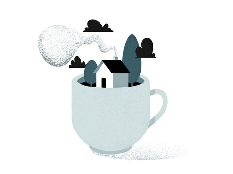 Coffee cup with cottage and flowers inside