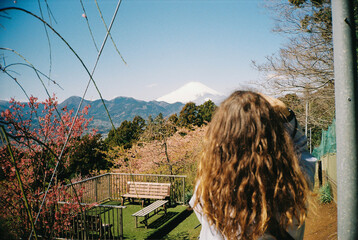 Anonymous woman taking photo of Fuji