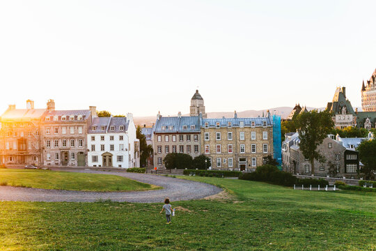 Kid in grass lawn over Quebec City