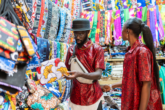 Shopping for fabric at a senegalese market