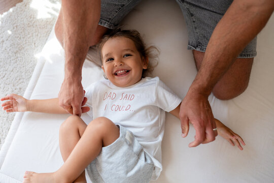Dad playing with hid daughter