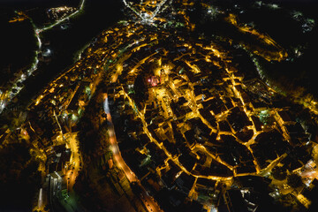 Aerial night view of an old roman town in Italy.