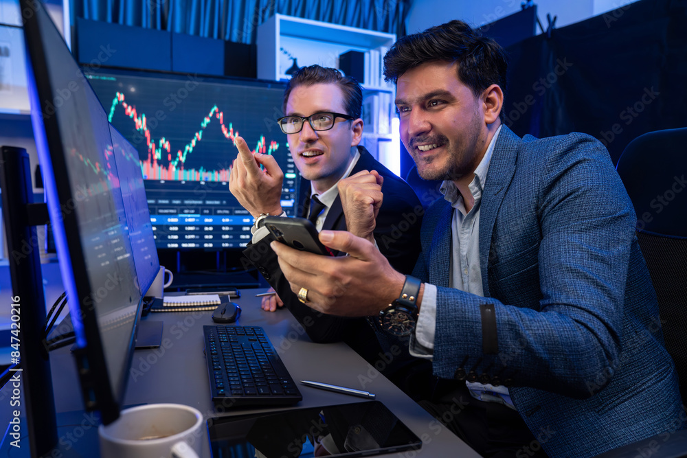 Poster two stock exchange traders comparing dynamic investment graph via phone and pc with high profit in c