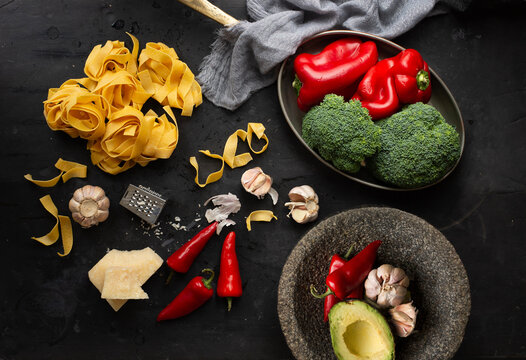 Raw pasta and vegetables 