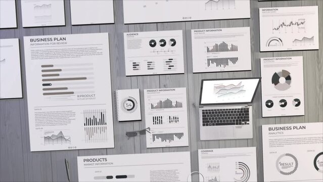 Animated workspace with laptop and business infographics.