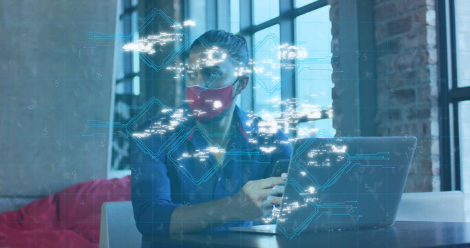Image of data processing over caucasian businessman wearing mask using smartphone - Powered by Adobe