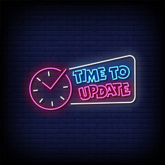 Obraz premium time to update neon Sign on brick wall background vector