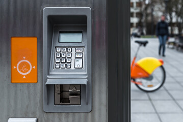 Panel Screen Of City Bike Rental Service Ticket Machine In Front Of Sidewalk Background